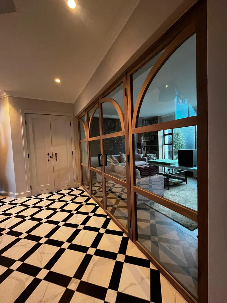 Bespoke joinery — arched glass doors